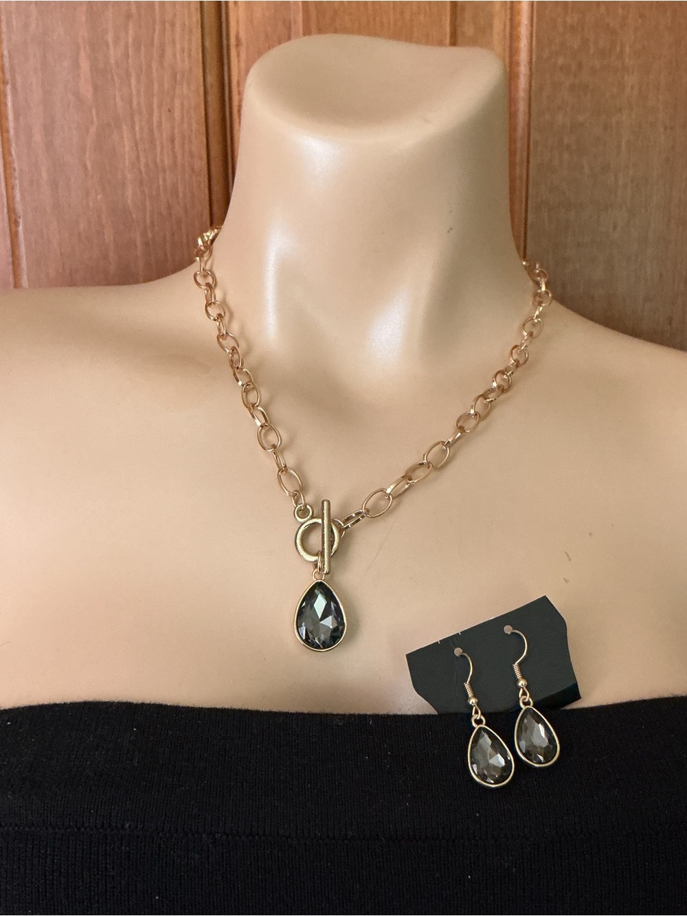 Two necklaces one Gold tone one silver tone